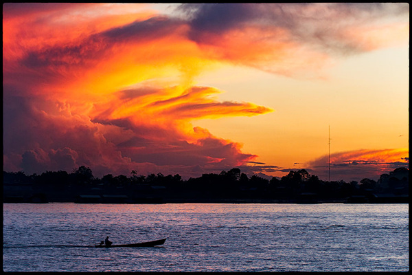 1024px-Sunset_on_the_Amazon_(7613489930).jpg